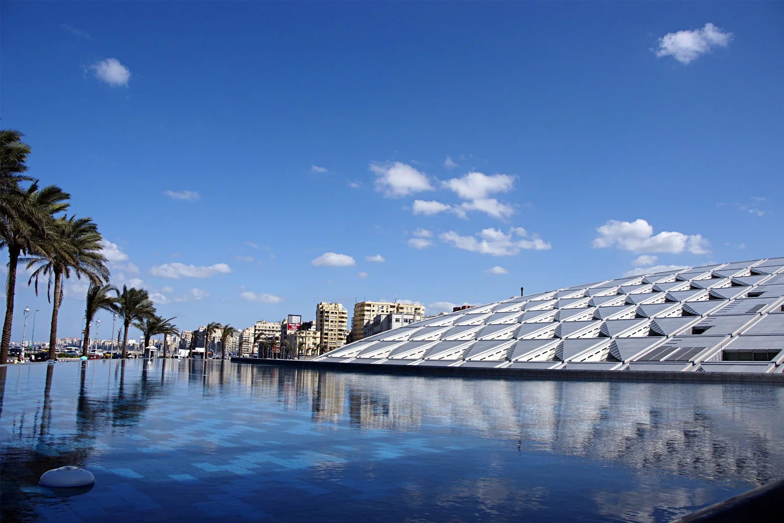 The architectural roof and reflecting pool of the Bibliotheca Alexandrina
